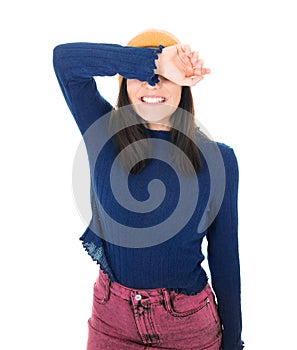 Shame. Close up young woman covering face with hands, isolated on white background. Ashamed girl