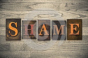 Shame Wooden Letterpress Theme photo