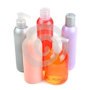 Shampoo bottles and soap dispensers photo
