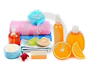 Shampoos, soap, towels and other bath accessories isolated on a white