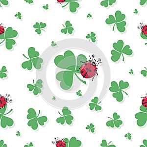 Shamrock background. Clover leaves, ladybug. Vector spring pattern.