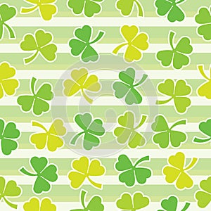 Shamrock leaves seamless pattern on green striped background suitable for St Patrick Day& x27;s scrap paper