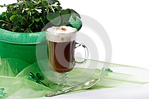 Shamrocks and Irish coffee on white