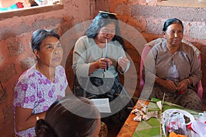 Shan women making decorations