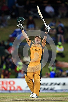 Shane Watson celebrates on his century