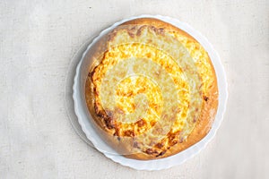 Shanga: traditional Russian pastries with potatoes and eggs. Khachapuri with cheese, egg and garlic.