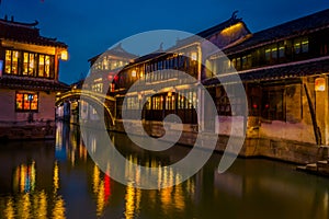 SHANGHAI, CHINA: Beautiful evening light creates magic mood inside Zhouzhuang water town, ancient city district with