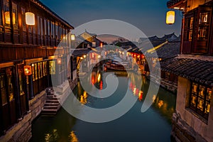 SHANGHAI, CHINA: Beautiful evening light creates magic mood inside Zhouzhuang water town, ancient city district with