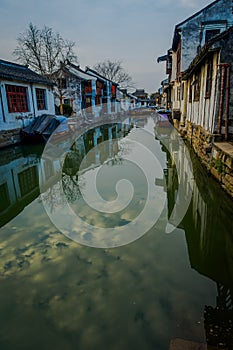 SHANGHAI, CHINA: Famous Zhouzhuang water town, ancient city district with channels and old buildings, charming popular
