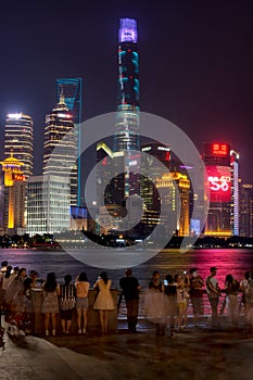 Night view of Pudong new area skyscrapers in Shanghai across Huangpu River