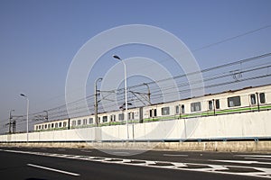 Shanghai metro train travels toward the city area