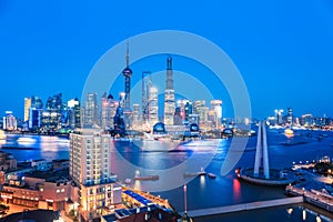 Shanghai skyline and huangpu river in nightfall