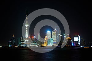 Shanghai skyline with modern urban skyscrapers at night, China