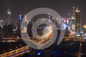 Shanghai skyline at night with the Shanghai Tower and Shanghai World Financial Center on background