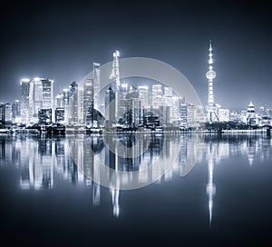 Shanghai skyline night view and reflection