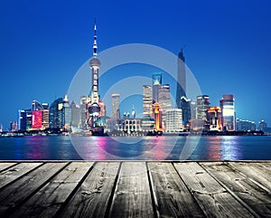 Shanghai skyline and wooden