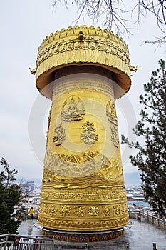 Shangri-La Golden temple or Dafo temple With giant Spinning Golden Wheel at Dukezong old town, located in Zhongdian city  Shangri