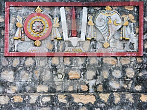Shanka, Chakra and Tilak Mural on Temple Wall. photo