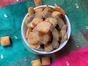 Shankarpali also called shakarpara is a deep fried, sweet.