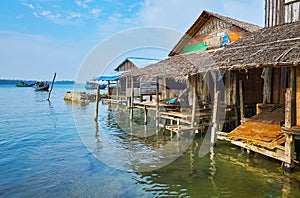 The shanties at the fishing harbor, Chaung Tha, Myanmar photo