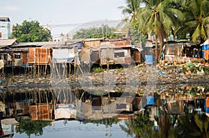 Portrait of Shanty town Along River photo