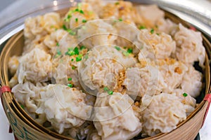 Shaomai is a Chinese food which it made from pork on top with fried garlic and chopped spring onion.