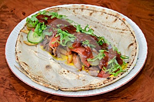 Shaorma shawarma kebab on a plate before being wrapped