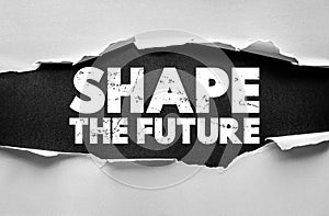 SHAPE THE FUTURE text on torn paper background, concept of innovation, creativity, progress, vision, and leadership