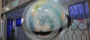 the shape of a globe that describes the shape of the earth