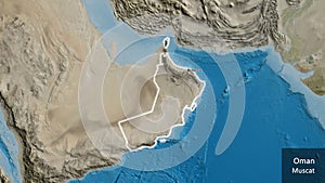 Shape of Oman. Glowed. Satellite. Labels