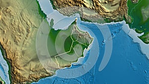 Shape of Oman with regional borders. Physical.