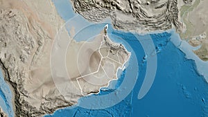 Shape of Oman with regional borders. Satellite.