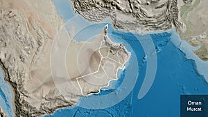 Shape of Oman with regional borders. Satellite. Labels