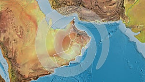 Shape of Oman with regional borders. Topographic.