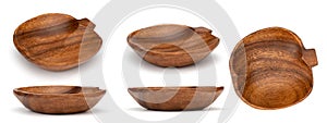 Shaped apple wooden bowls isolated on white. Set of empty wood bowls for dry fruits and nuts in collage for your design.