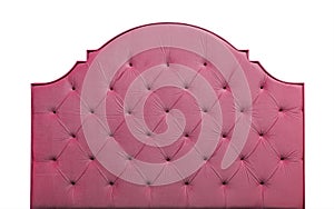 Pink velvet bed headboard isolated on white photo
