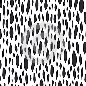 Shapeless modern drops. Seamless trendy pattern for fabrics. White and black.