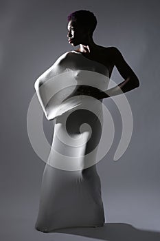 Shapely Woman in Creative Light and Spandex Fabric