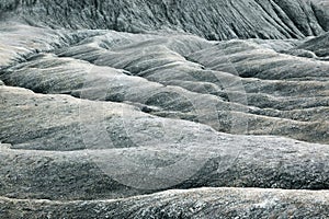 Shapes in ground formed by the mud flows at Muddy Volcanoes of Paclele Mari, near Buzau.