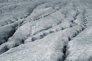 Shapes in ground formed by the mud flows at Muddy Volcanoes of Paclele Mari, near Buzau.