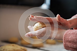 Shaping balls of vegan pastry dough photo