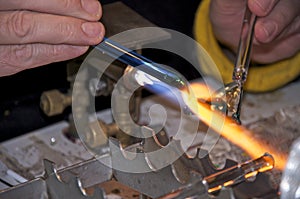 Shaping glass in fire