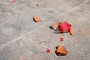 Shards of broken red clay pot