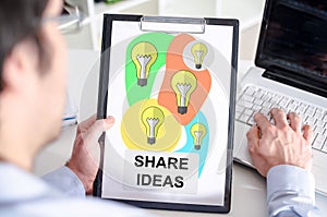 Share ideas concept on a clipboard