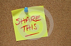 Share This Sticky Note on a Cork Notice Board