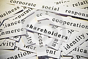 Shareholders. Concept of cutout words related with business. photo