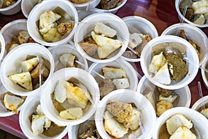 Sharing food on Kirab ketupat. Kirab ketupat is a celebration of Eid al-Fitr by distributing free food