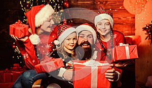 Sharing memories. Happy family celebrate new year and Christmas. open xmas present. gifts from santa. santa father at