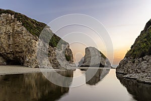 Shark Fin Cove Reflecting at Sunset