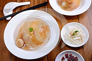 Shark fin soup in chinese style on white bowl